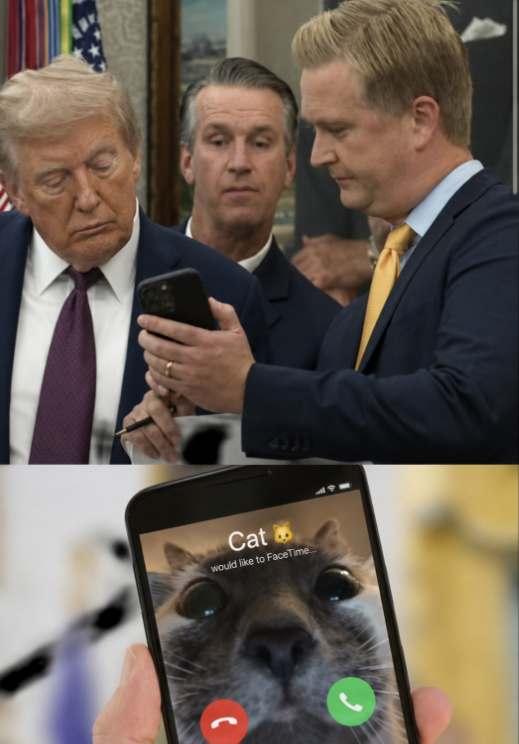 A room full of people looking at one phone